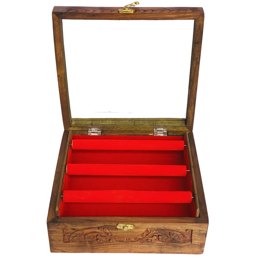 Handcrafted bangle box with intricate carving – elegant wooden jewelry organizer.