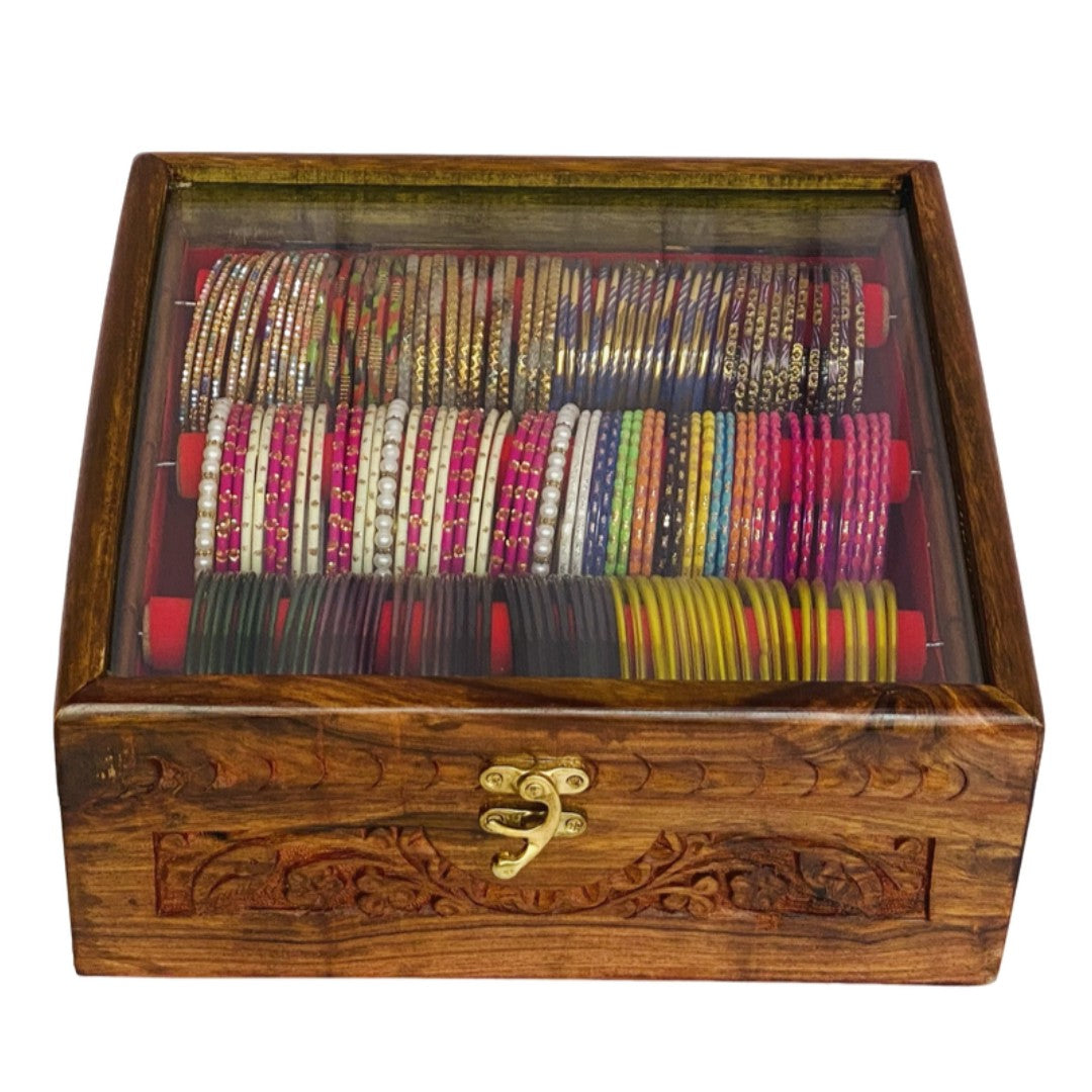 Handcrafted bangle box with intricate carving – elegant wooden jewelry organizer.