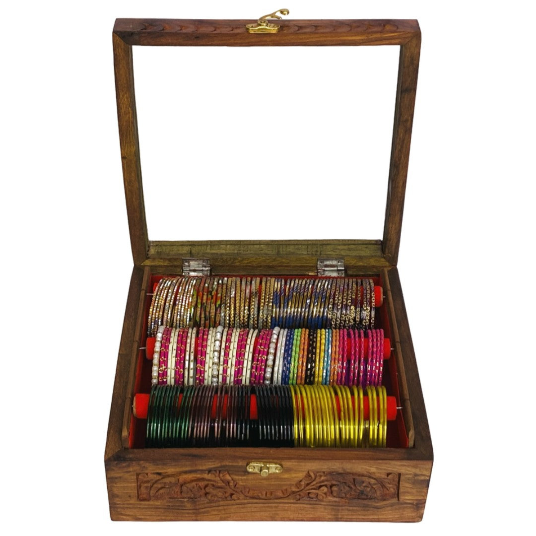 Handcrafted bangle box with intricate carving – elegant wooden jewelry organizer.