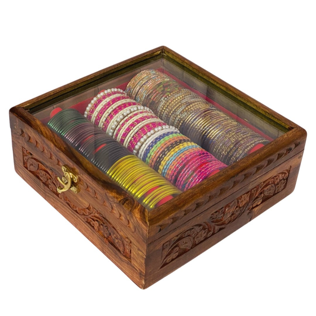 Handcrafted bangle box with intricate carving – elegant wooden jewelry organizer.