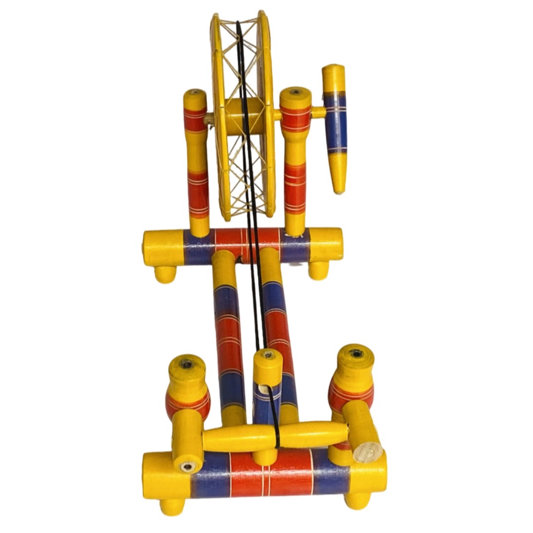 Traditional wooden Charkha – handcrafted decorative piece for cultural home decor.