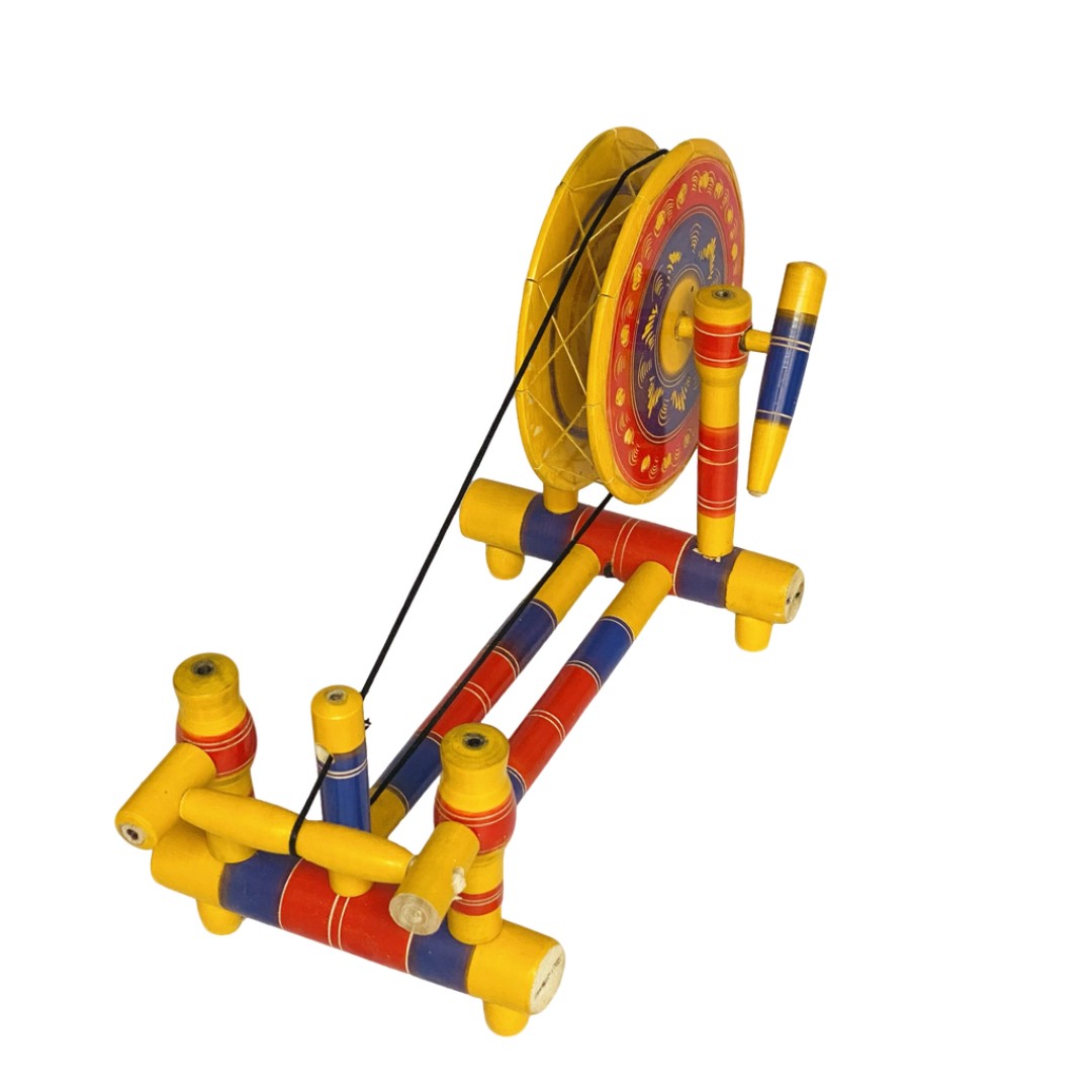 Traditional wooden Charkha – handcrafted decorative piece for cultural home decor.