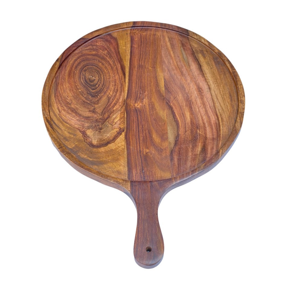 Set of three handcrafted wooden serving platters with natural acacia wood grain patterns and handles, arranged in a nested display
