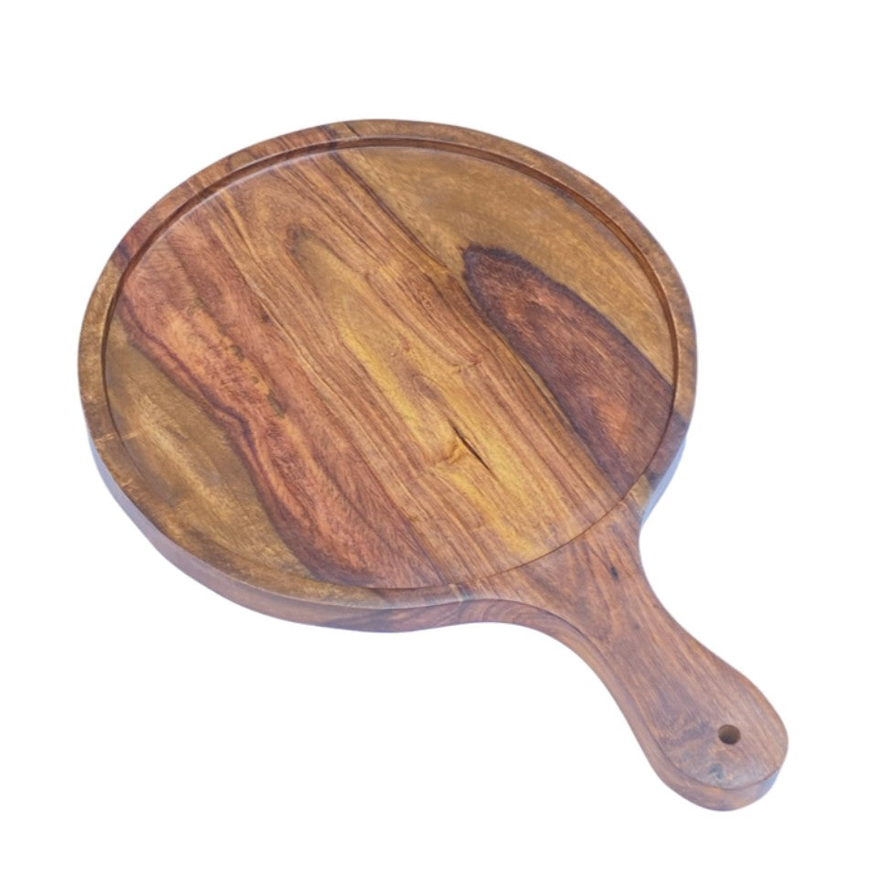 Set of three handcrafted wooden serving platters with natural acacia wood grain patterns and handles, arranged in a nested display