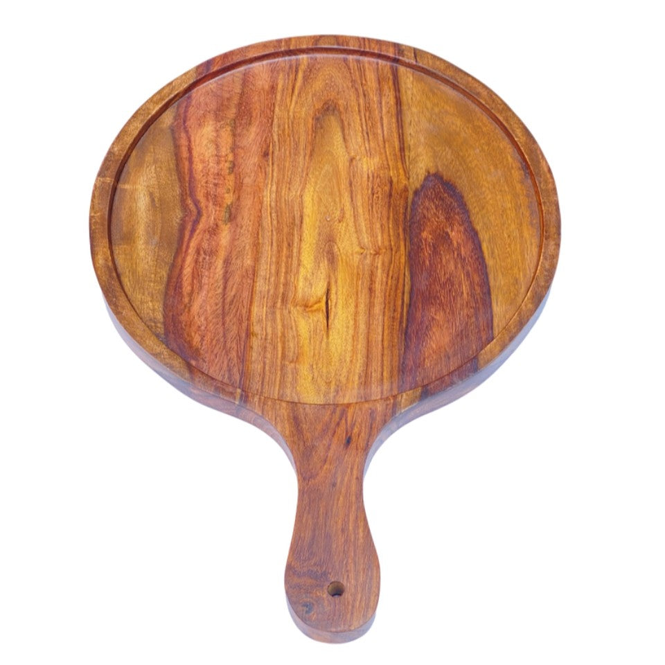 Set of three handcrafted wooden serving platters with natural acacia wood grain patterns and handles, arranged in a nested display