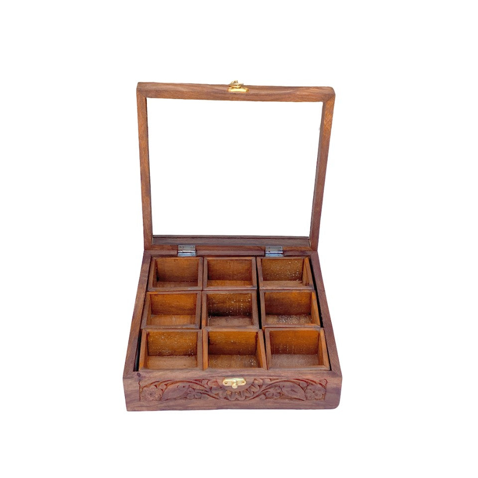  Handcrafted wooden spice box with 9 compartments, glass lid and decorative floral carving, perfect for organizing kitchen spices and herbs.