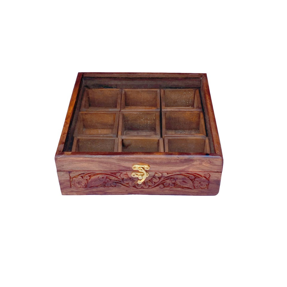  Handcrafted wooden spice box with 9 compartments, glass lid and decorative floral carving, perfect for organizing kitchen spices and herbs.