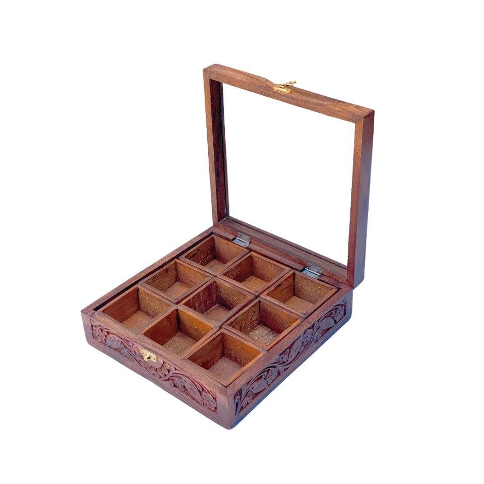  Handcrafted wooden spice box with 9 compartments, glass lid and decorative floral carving, perfect for organizing kitchen spices and herbs.