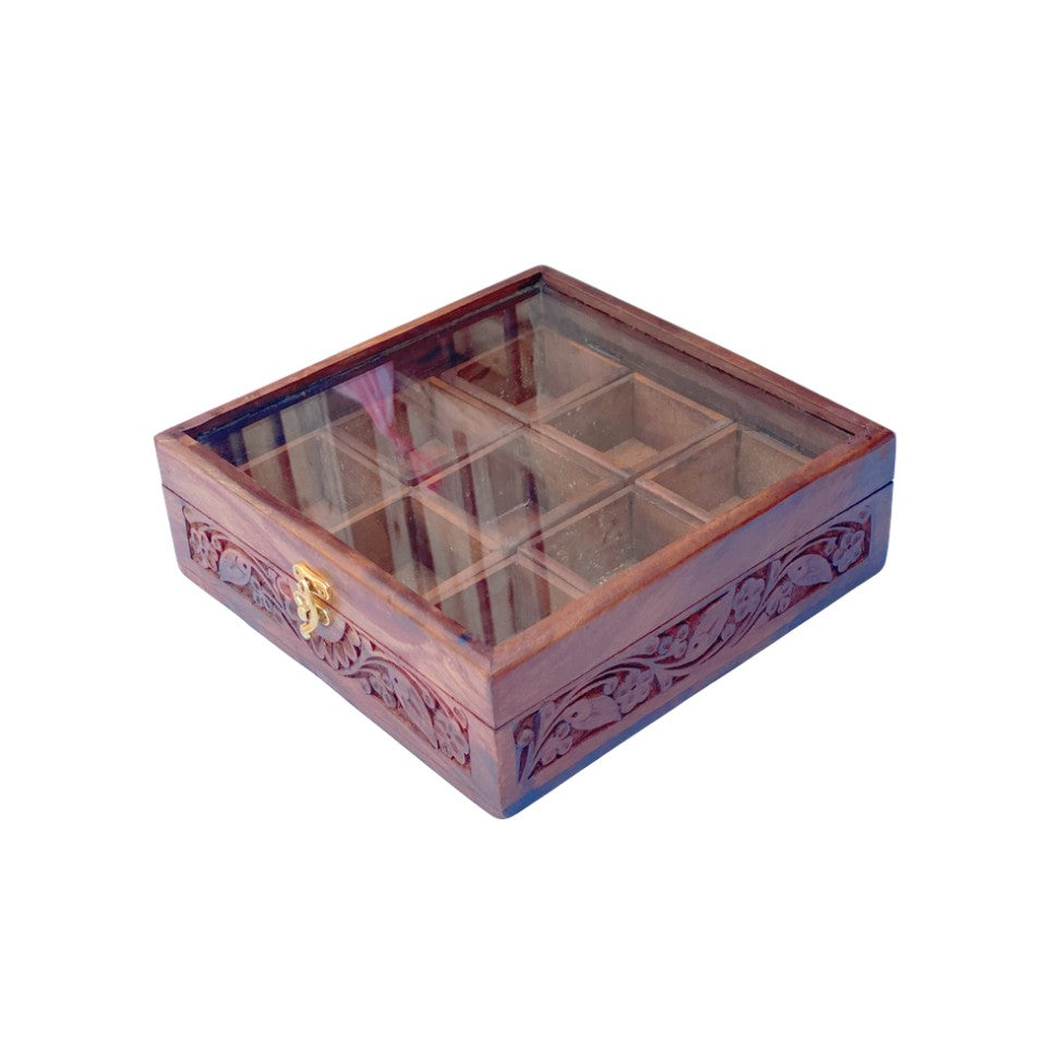  Handcrafted wooden spice box with 9 compartments, glass lid and decorative floral carving, perfect for organizing kitchen spices and herbs.