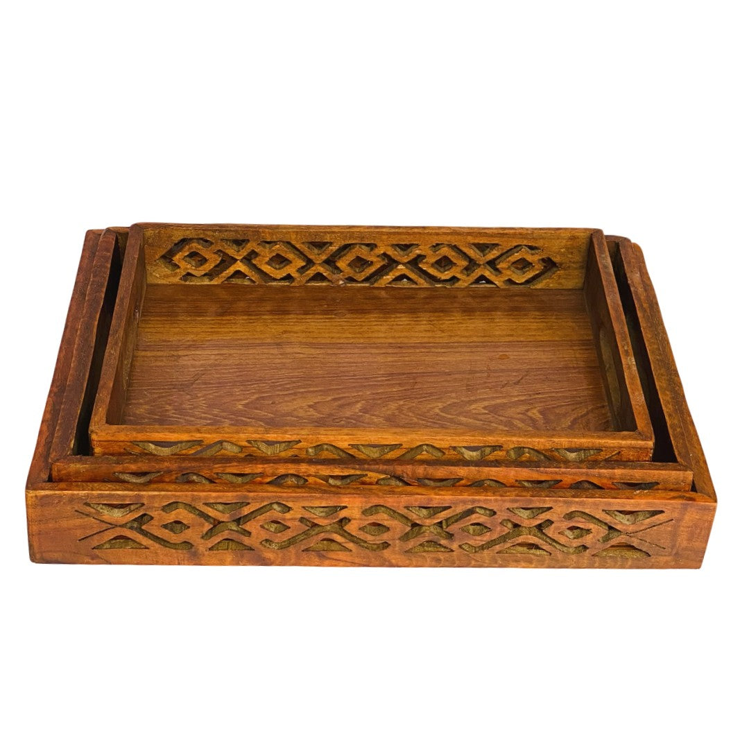 Wooden tray set with intricate cutwork – elegant handcrafted serving trays.