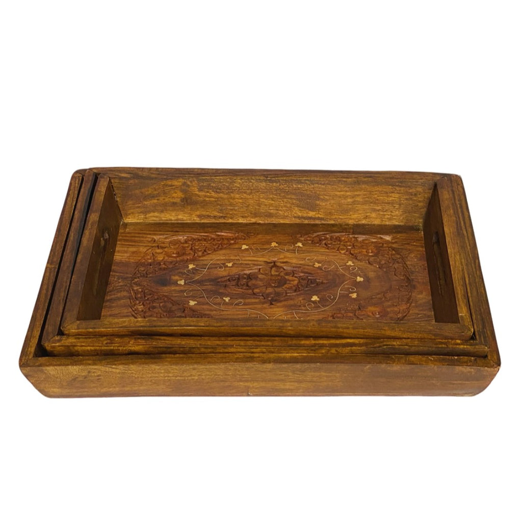 Handcrafted tray set with brass and carving design – elegant decorative serving trays.