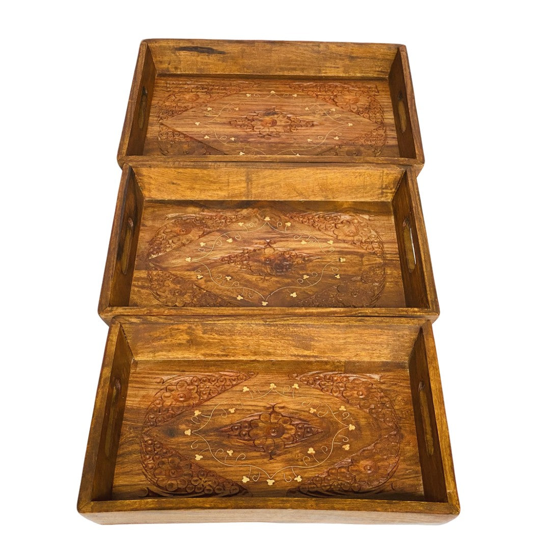 Handcrafted tray set with brass and carving design – elegant decorative serving trays.