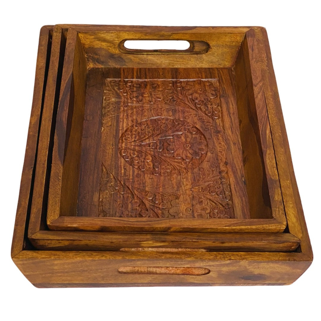 Handcrafted tray set with brass and carving design – elegant decorative serving trays.