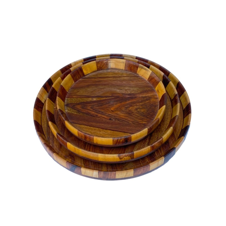  Handcrafted wooden plate set with multi-wood mosaic design featuring three nested plates in varying sizes made from walnut, cherry, and maple woods.