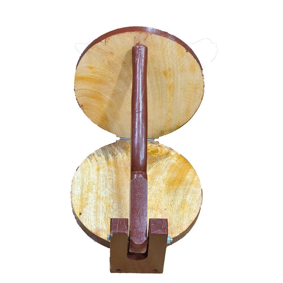 Traditional wooden roti maker with circular press plate and lever handle, handcrafted from rich brown wood for making fresh flatbreads