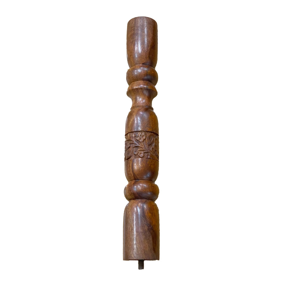 Handcrafted wooden pedestal table with intricate carved floral and paisley motifs covering the round tabletop and circular base, featuring a turned wooden pedestal stem with traditional carved details
