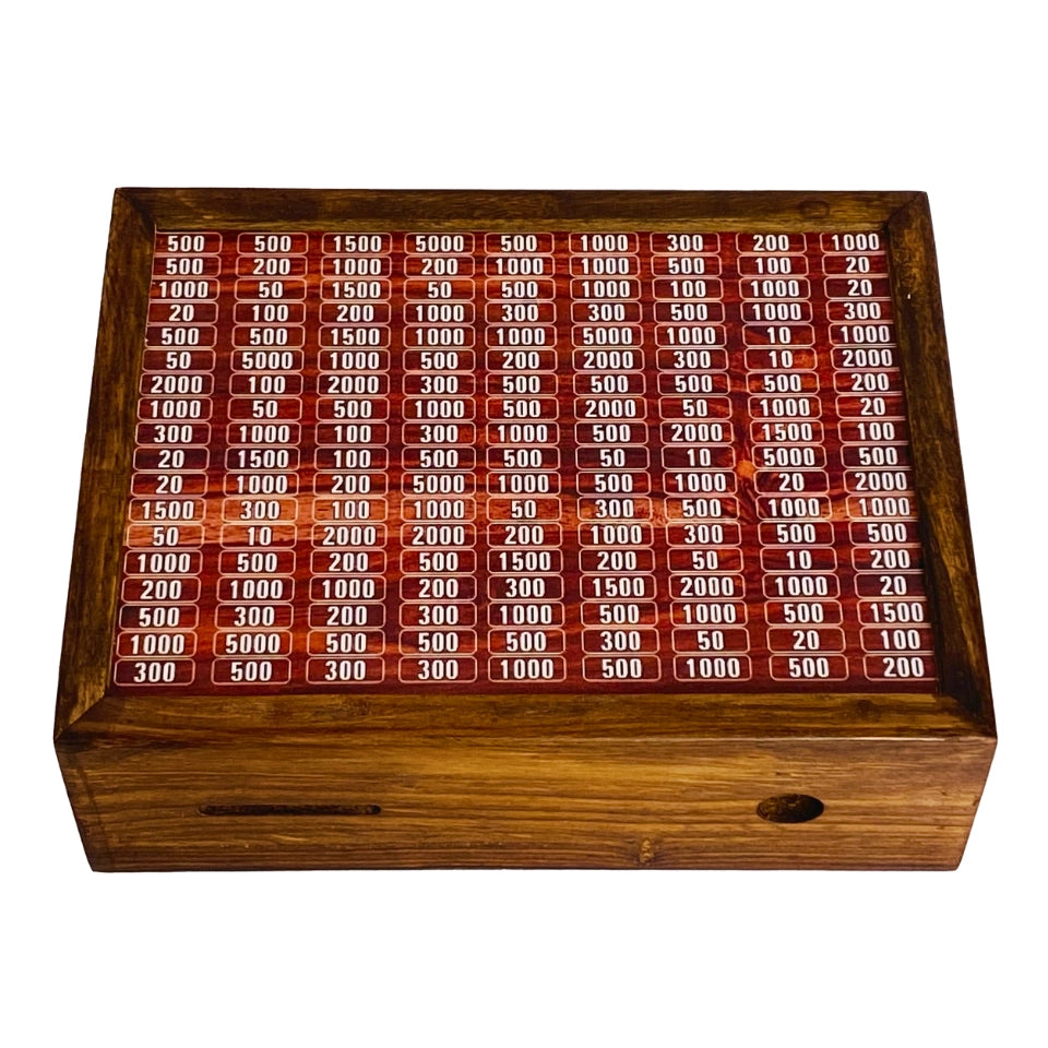 Wooden Umrah Saving Box with numbered compartments for Pakistani Rupee amounts on red background. Traditional Islamic savings method for pilgrimage fund with 210,000 PKR goal.
